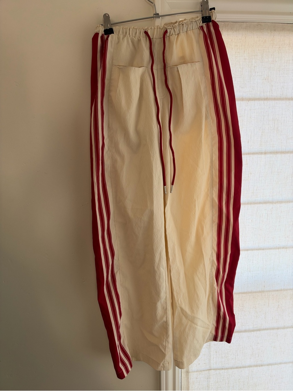 Cream Track Pants with Red Side Stripes and Drawstring Waist